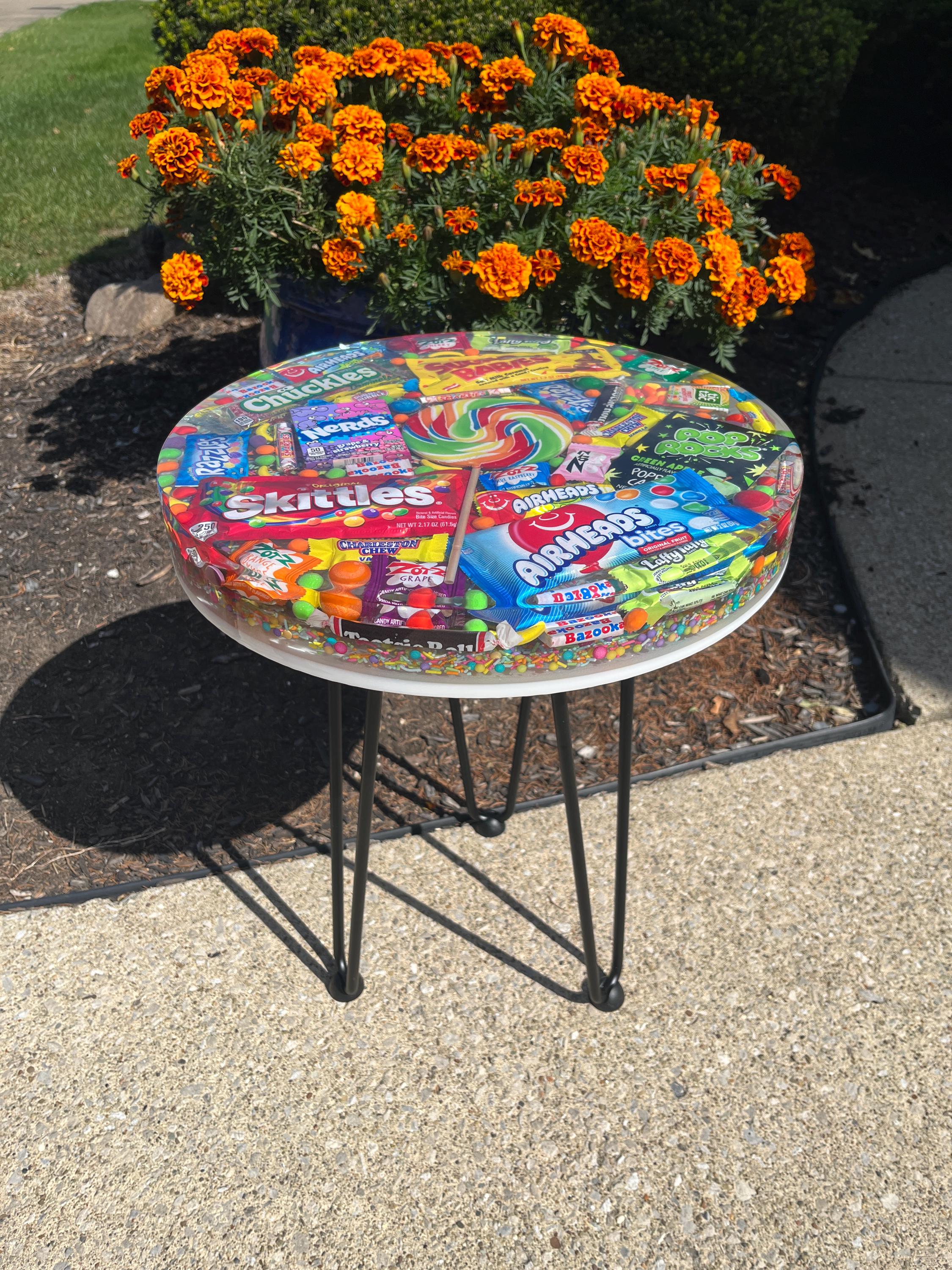 Candy-filled resin top accent table